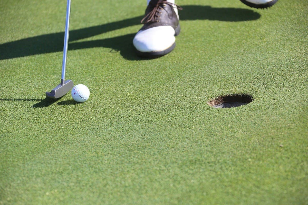 A putt lined up a few feet from the hole